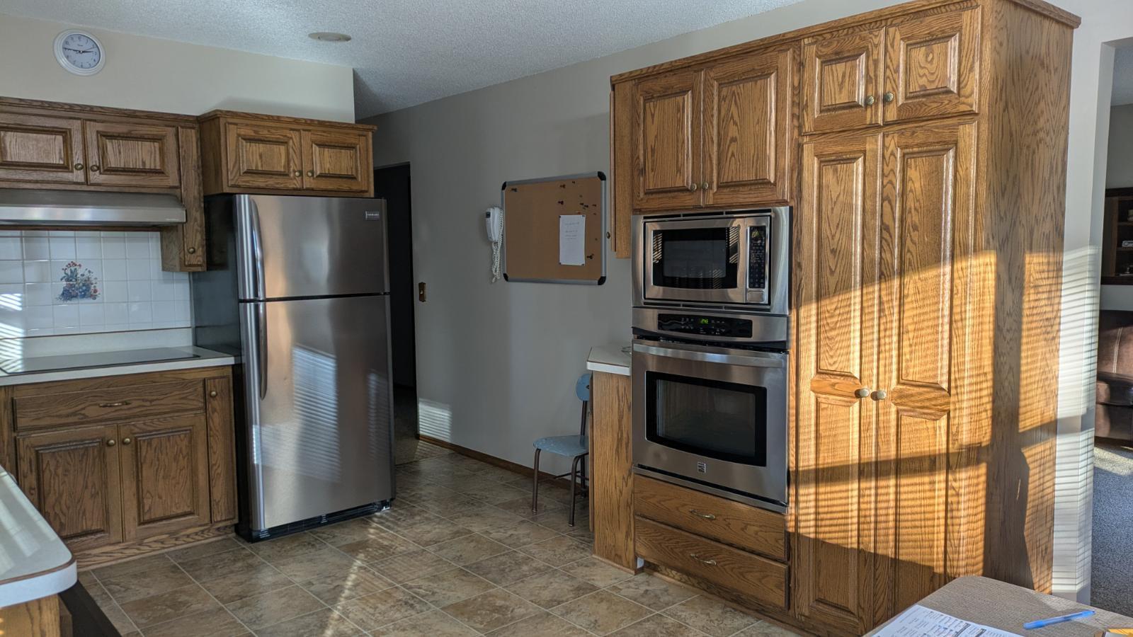 Pantry and built in microwave and wall oven.