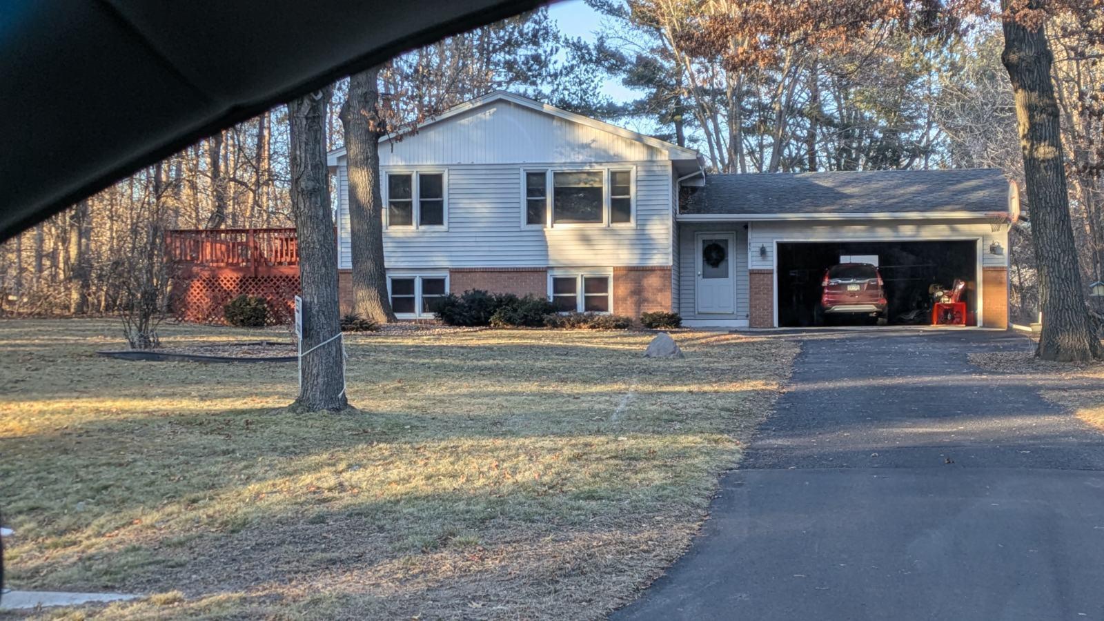 Newly seal coated asphalt driveway with space to back up, do a "Y" turn and drive straight out the driveway! Or nice just as an extra parking space! Might even be the access to that new out-building you put up!!! :) Talk to city for all details.