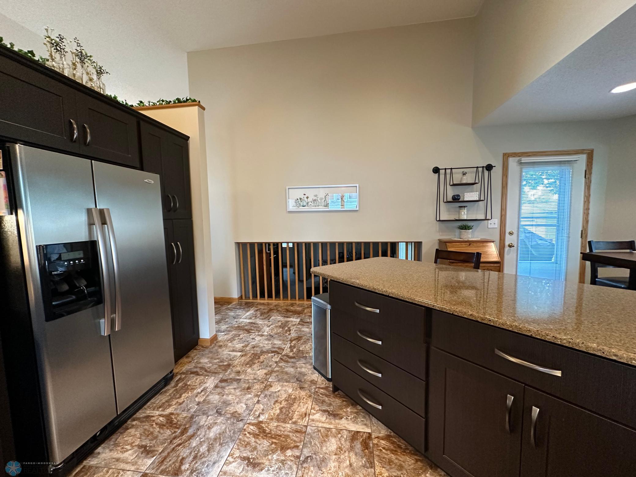 Open to lower level family room