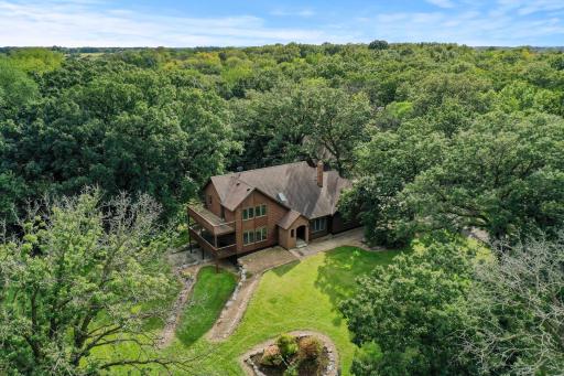 Extraordinary 14+ acre property surrounded by beautiful oak trees.