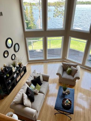 Views of the living room from the upper level balcony
