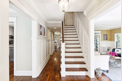The home has beautiful hand-scrapped walnut floors on the main and upper level.