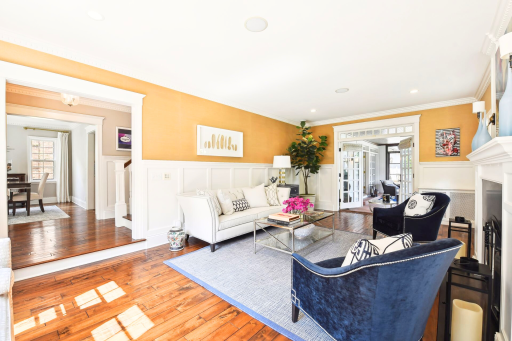 The formal living room with gas fireplace