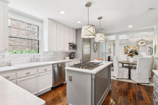 Enjoy gathering around the kitchen island or the breakfast table.
