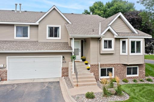 Beautiful move-in ready end unit townhome with wonderful features throughout!