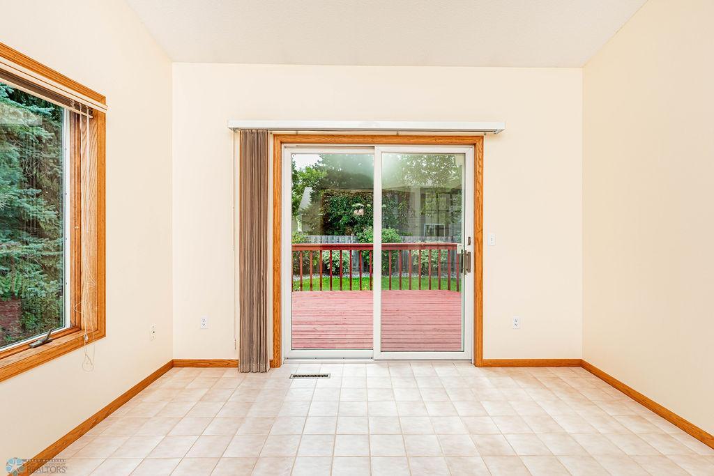 Sunroom with Patio Door to Deck
