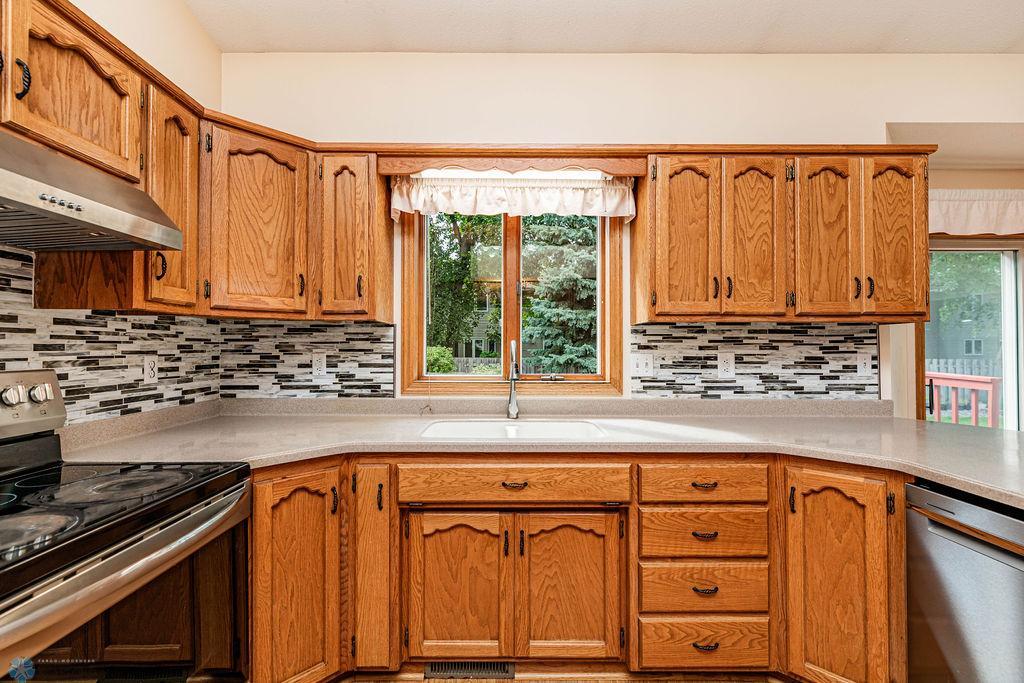 Kitchen Window to Treed Backyard