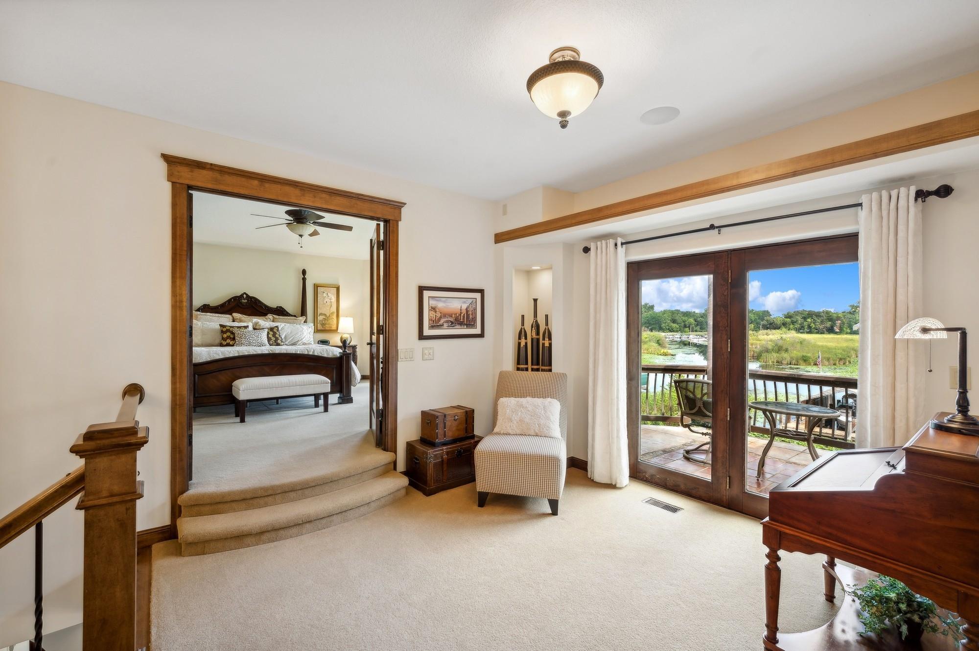 Top of staircase sitting area with balcony