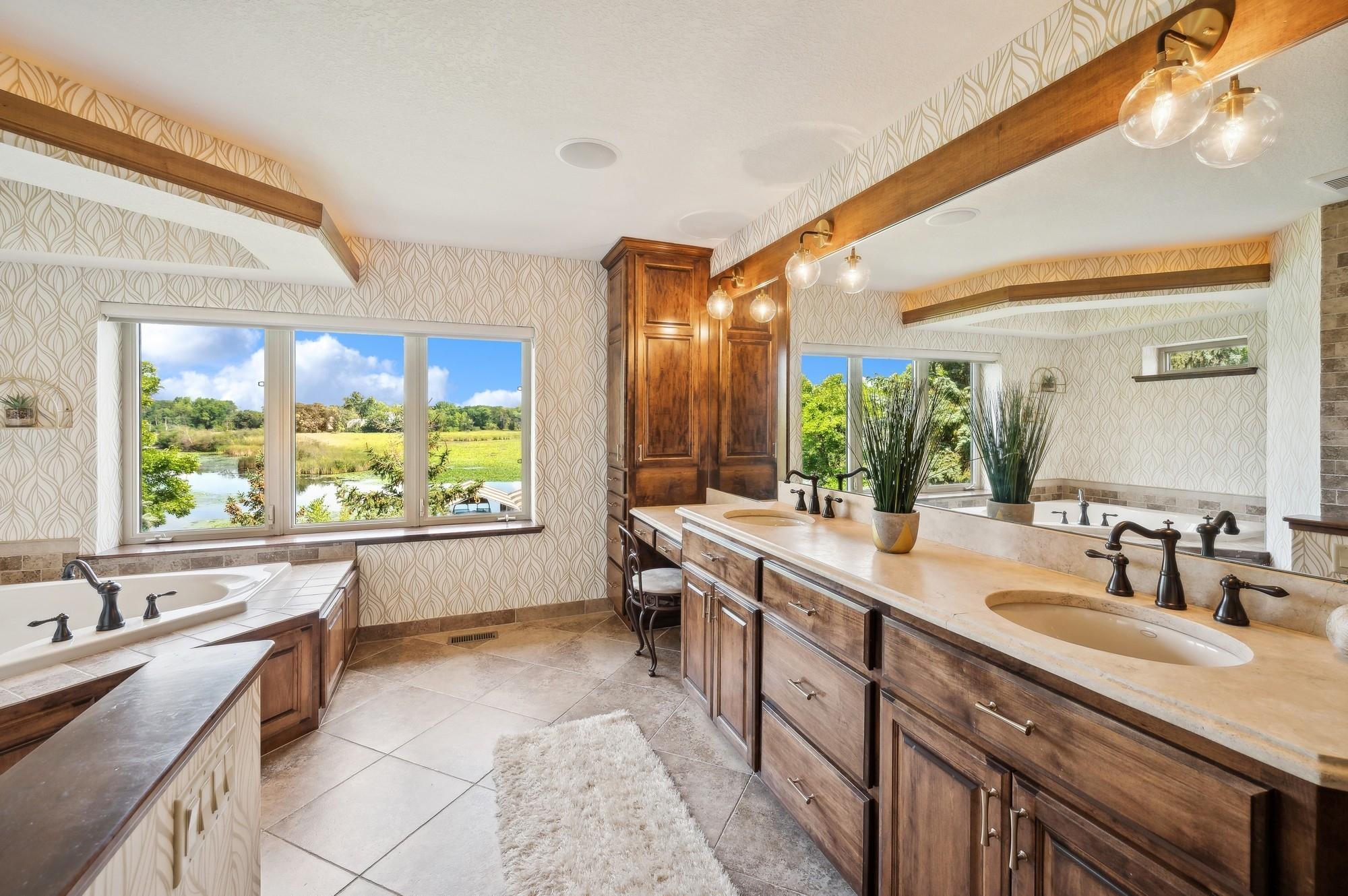 Primary Bath includes double vanity, whirlpool tub and walk in shower