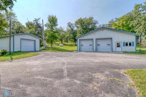 Main shop w/ living space + additional garage