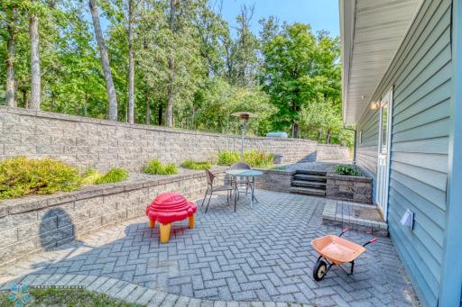 Exterior rear Patio and extensive retaining wall