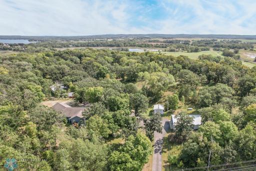 Incredible property! Shoreline on 2 separate lakes, mature trees, outbuildings galore, multiple building sites and 38+ acres!