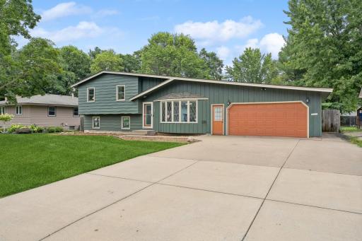 This move-in ready home sits on a quiet street in the heart of Historic Anoka. It features a huge concrete driveway, recent exterior paint and updated exterior lights & doors!
