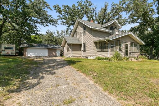 Welcome to 445 5th St NE- 5 beds, 2 baths, a 3 stall heated garage and a great corner lot!