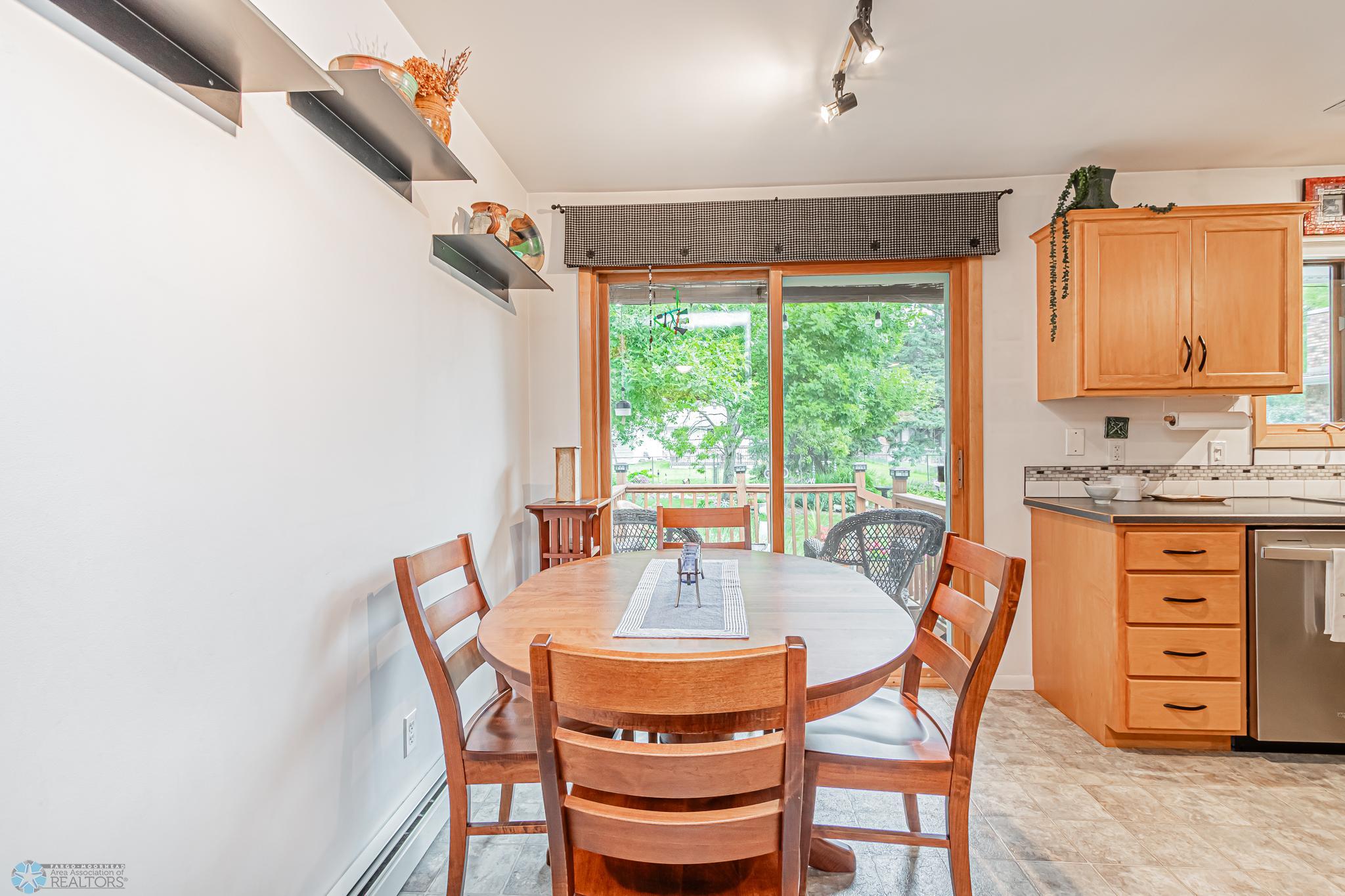 Kitchen eating area and patio door to deck