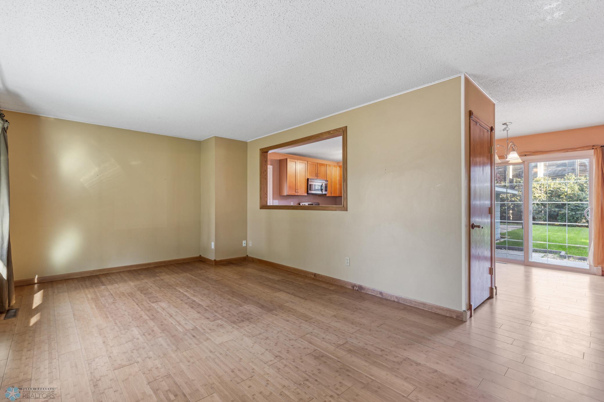 Living room, opens to kitchen