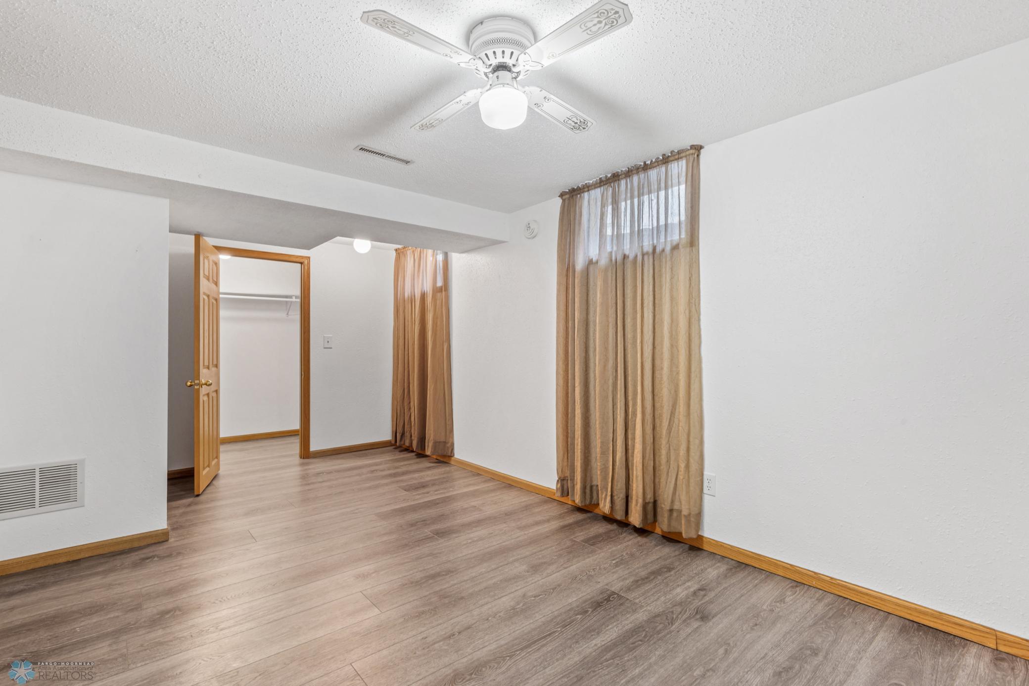 Basement office w/ walk-in closet, add egress for 4th bedroom.