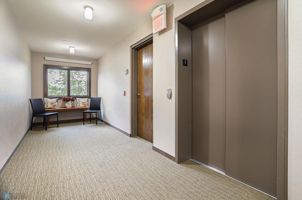 1st floor hallway stairs and elevator
