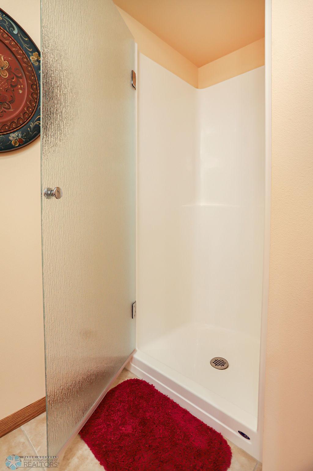 Main 3/4 bath, located near den