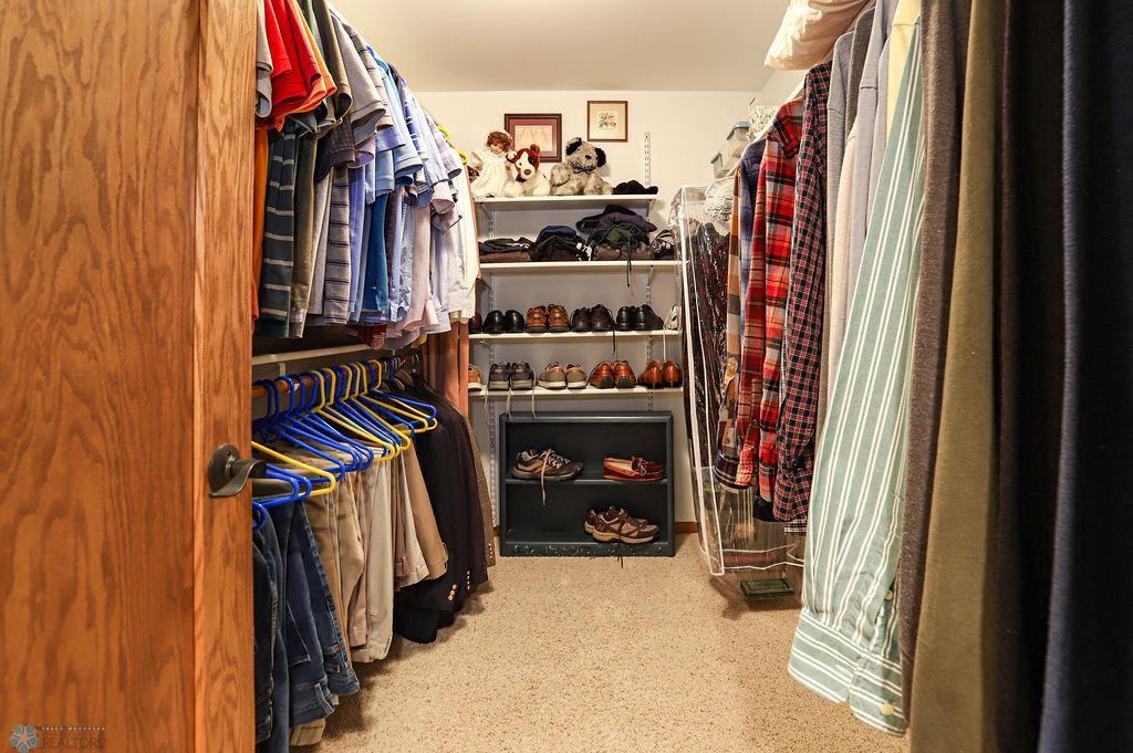 Walk-in closet in primary bedroom