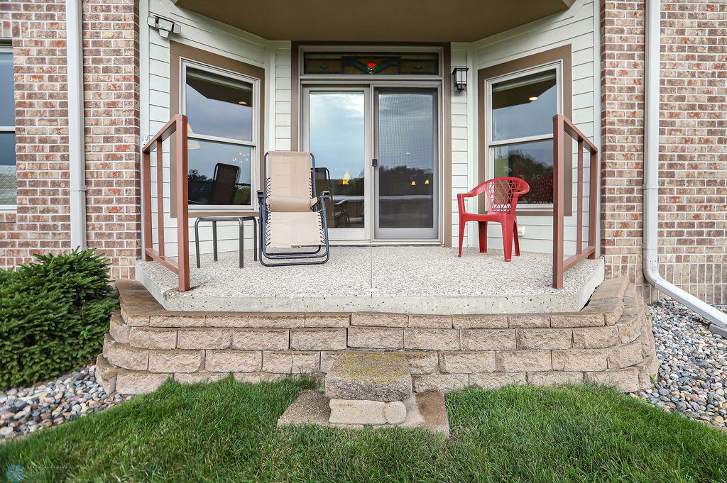 Patio area faces east. Steps can be built if desired!