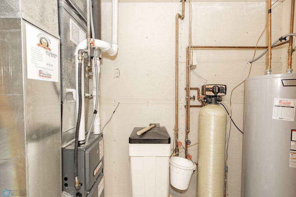 Utilities - newer furnace (2019) and water heater(2023).jpg