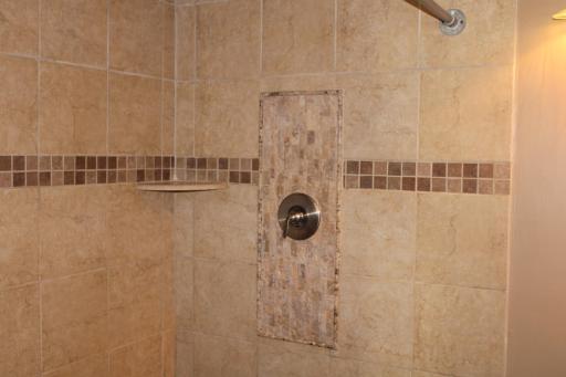 Well designed lower level bathroom