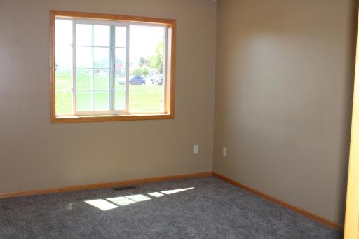 One of the bedrooms with new carpet all over the house