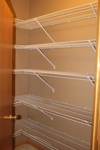 Spacious pantry with shelves to store your groceries