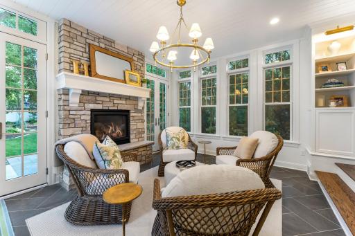 The sunroom overlooks the patio and back yard