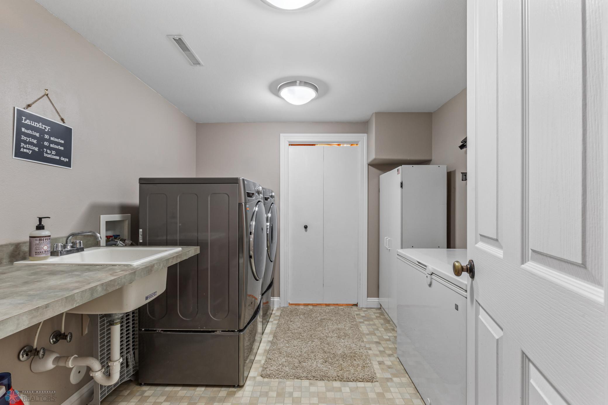 basement laundry - walk through storage room at the end