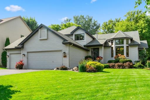 Photo for 1009 Crystal Lake Road W, Burnsville, MN 55306 - listing #6596432 Impressive curb appeal with a well-maintained facade and mature landscaping.