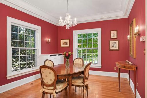 The spectacular dining room is perfect for formal entertaining and family get-togethers. It features and the ceiling is decorated with plaster genuine dentil cove with egg-and-dart crown molding.