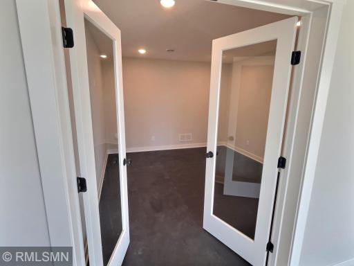 You'll have it all with the lower level exercise room offering rubber flooring, glass French doors and can lights.