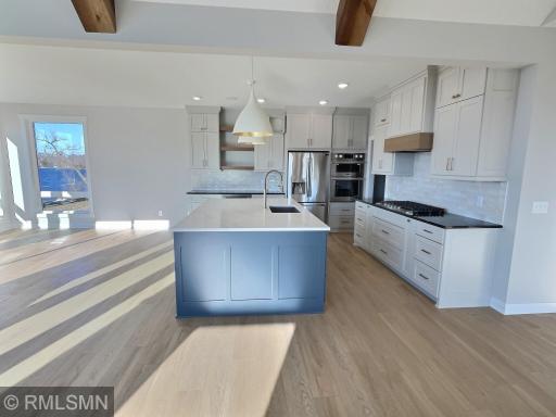 The kitchen opens up to the dining room to the left and also offers a fantastic 'butlers pantry', you'll never run out of space!