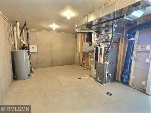 View of the utility room in the lower level, there is also an under stair storage area across the hall.