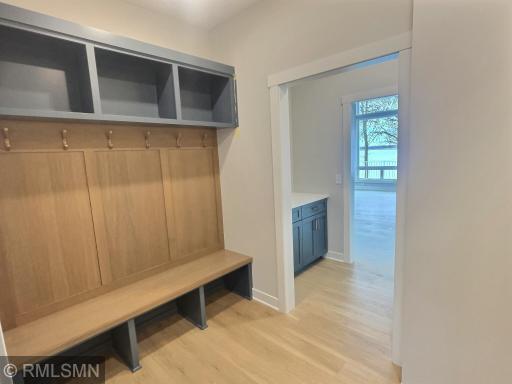Built in locker system in the mud room off the garage offers a bench, built in cubbies...wonderful for organization!