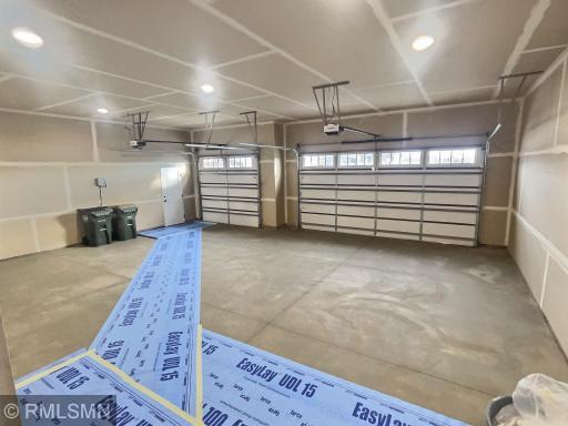 The triple garage (all with openers) is a great space for all your vehicles and toys and leads into a spacious mud room.