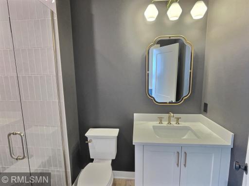 Located on the main level, this 3-quarter bathroom is next to the mud room garage, wash your hands right after all your lawn work!