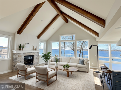 VIRTUALLY ENHANCED PHOTO - vaulted living room features soaring ceilings and a cozy gas fireplace, creating a spacious yet inviting atmosphere.