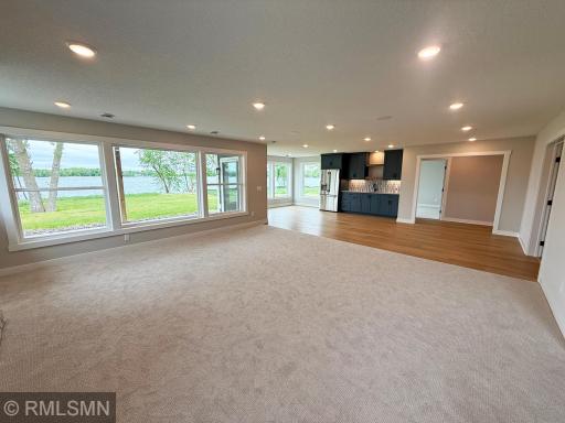Just imagine the spectacular lake views from the walk-out lower level where Lake John is just steps away!