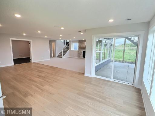 Entertain with a second dining room or lakeside patio area with windows that showcase Lake John year-round.