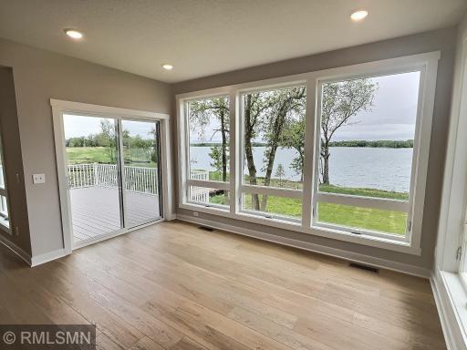 View of the dining room, you may just want to skip the table and cuddle up on a couch and take in the awe-inspiring views!