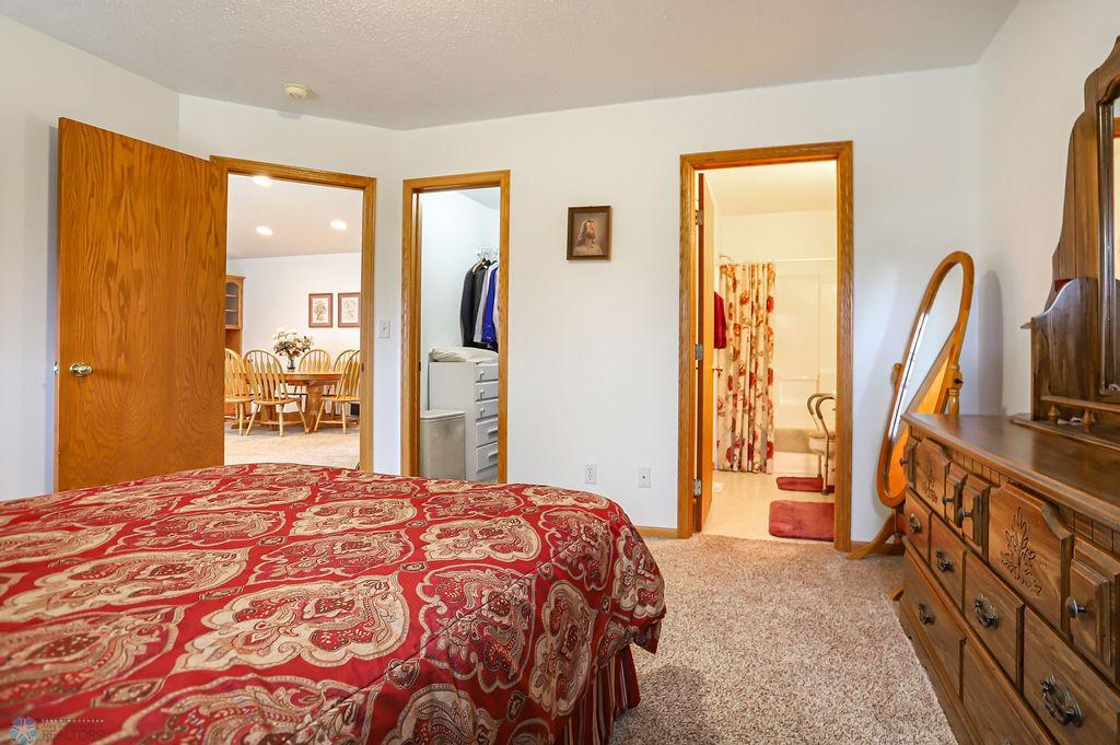 Primary bedroom view to bath