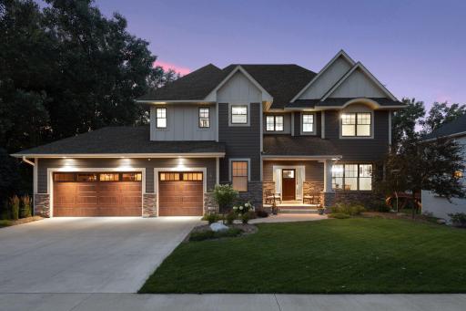 Exquisite 5BR/6BA custom built home overlooking Hidden Lake. Enjoy waterfront living in a prime location, offering unparalleled privacy in a serene neighborhood.