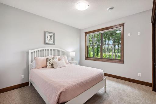 A nearby bathroom and 5th bedroom make this level perfect for guests.