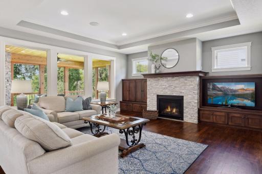 The great room, with cozy gas burning fireplace and custom built-ins.