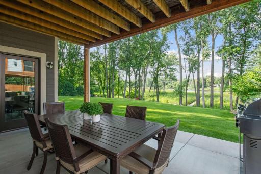 The lower level leads to a patio and, thanks to oversized windows, feels bright and inviting.
