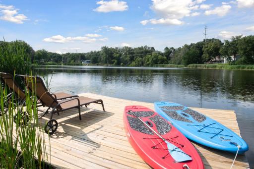 Take a long boardwalk through the woods to your private dock. Enjoy a book by the lake, paddleboarding, or other water activities in this serene setting.