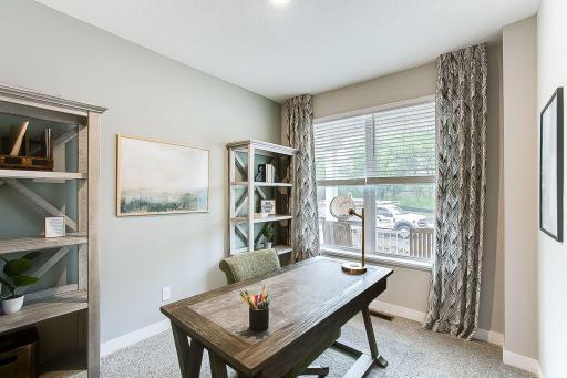Main level office with french doors. **PHOTO OF MODEL SELECTIONS AND COLORS WILL VARY!